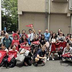 学生和教师与W合影&J flags in Japan.
